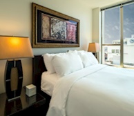 Master bedroom queen bed fully furnished apartment suite 702 Victoria