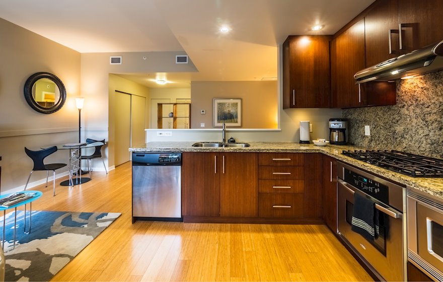 Dockside Green studio suite kitchen dining area 103B