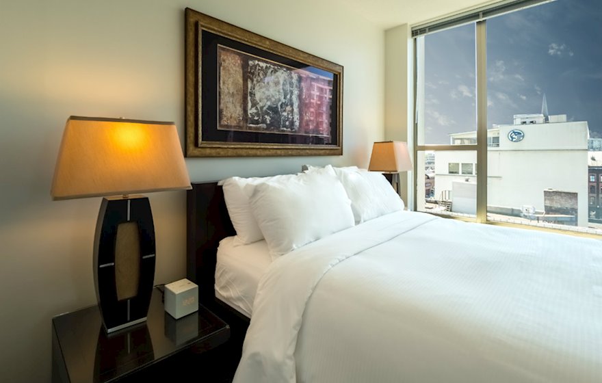 Master bedroom queen bed fully furnished apartment suite 702 Victoria
