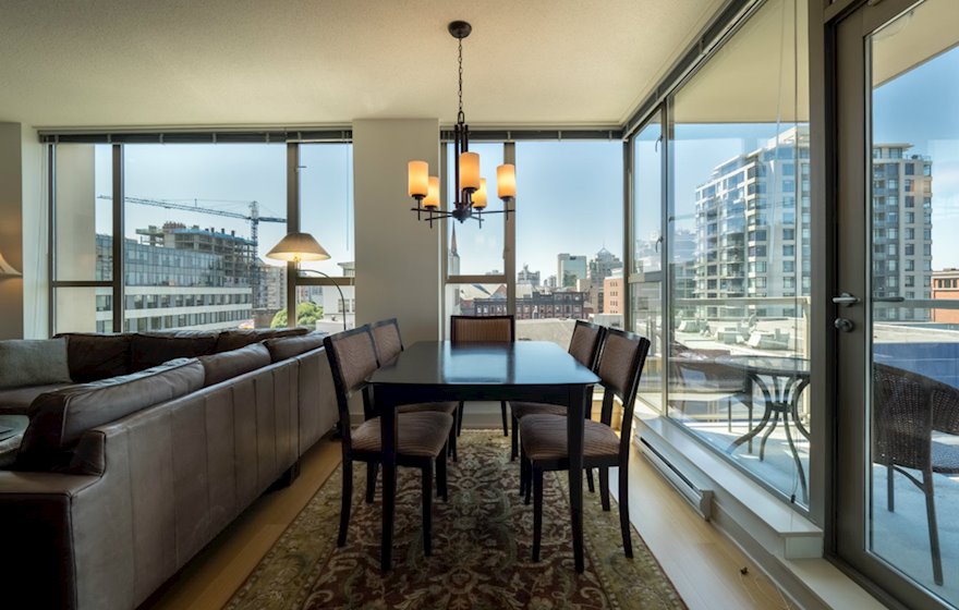 Dining room with a view fully furnished apartment suite 702 Victoria