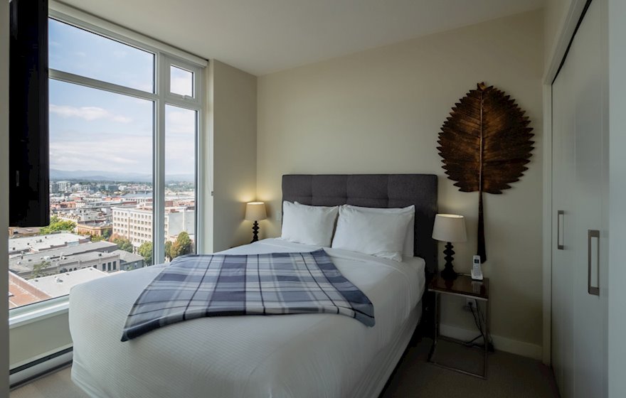 Furnished suite queen bedroom luxury linens Era 1209